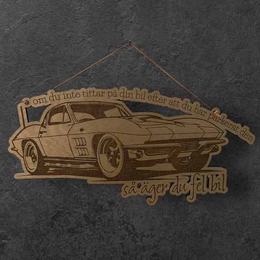 Skylt "om du inte tittar på din bil efter att du har parkerat den - så äger du fel bil"