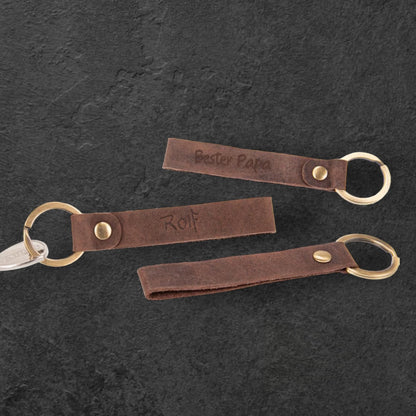 Nyckelring i läder med ögla och mässingsring