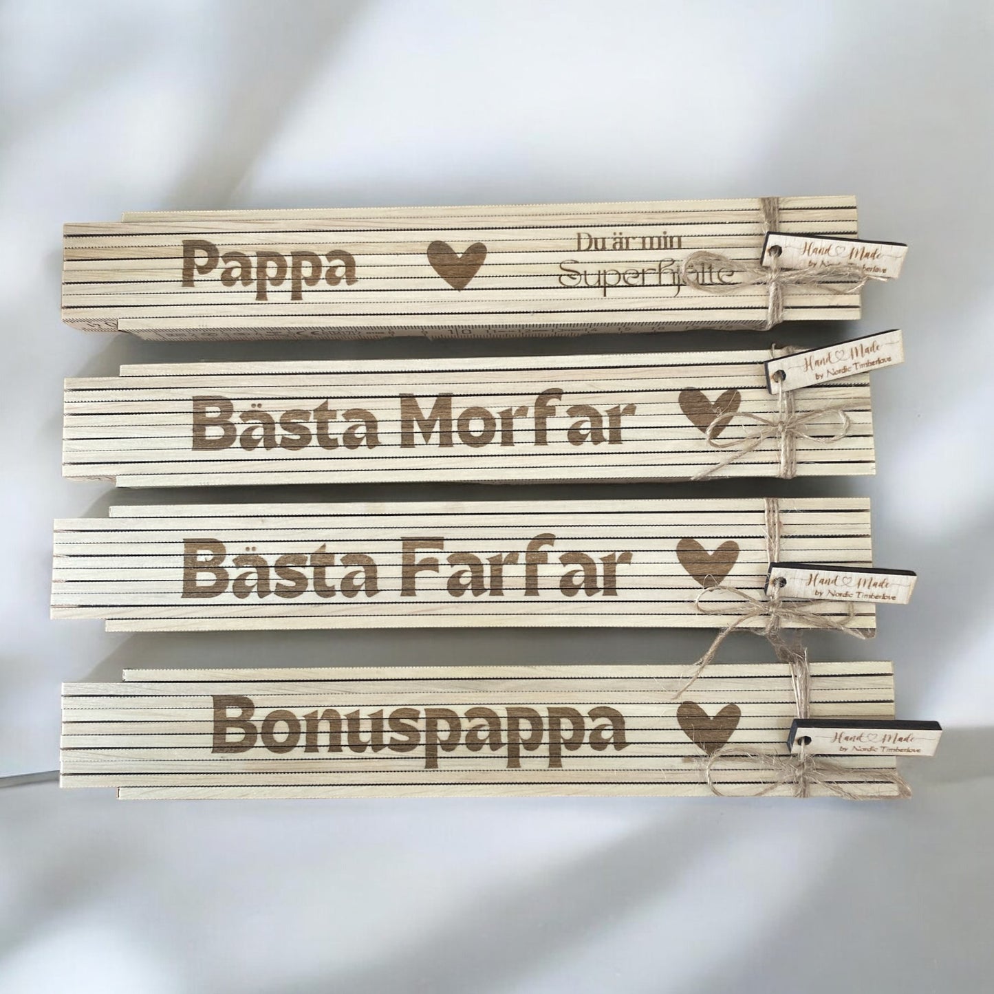 Personligt graverad tumstock