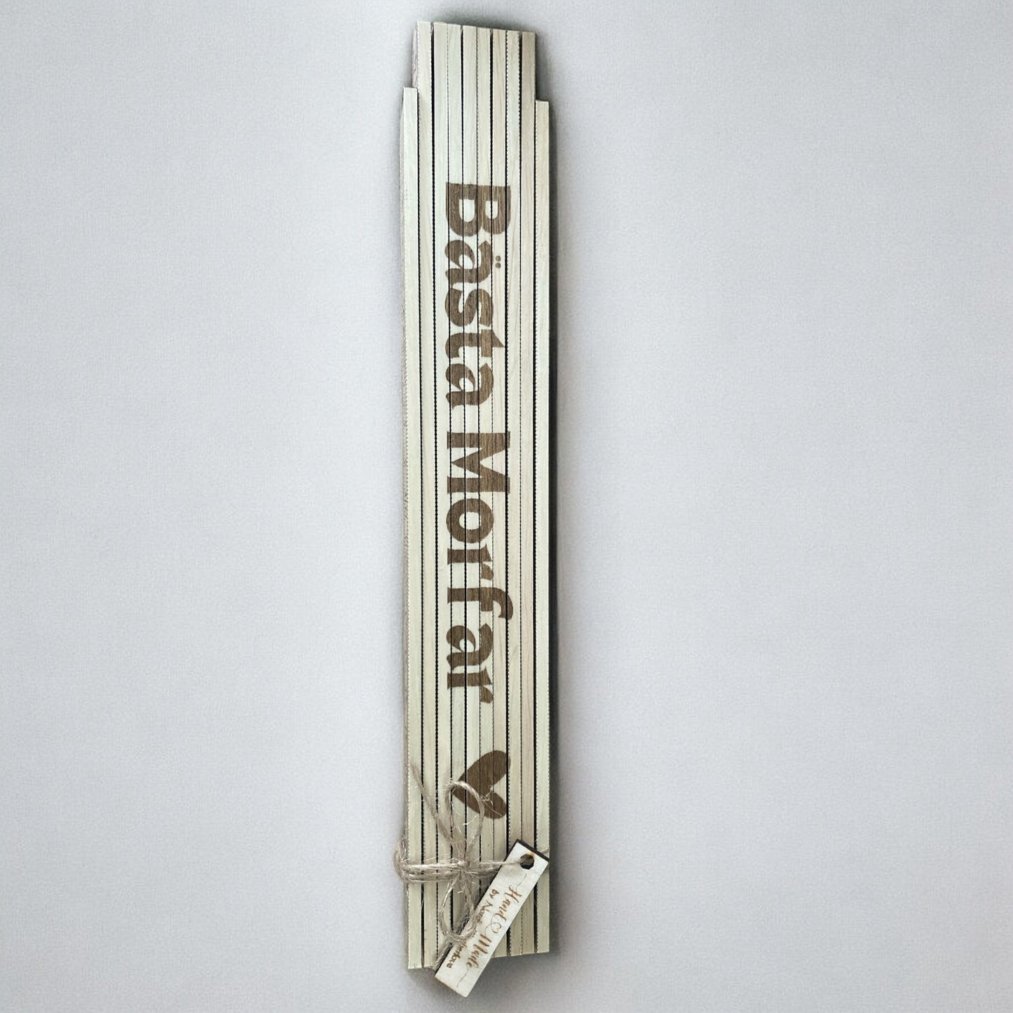 Personligt graverad tumstock