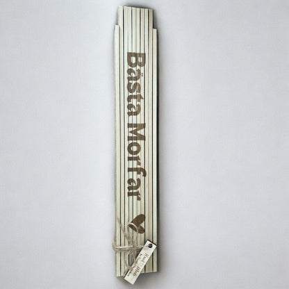 Personligt graverad tumstock